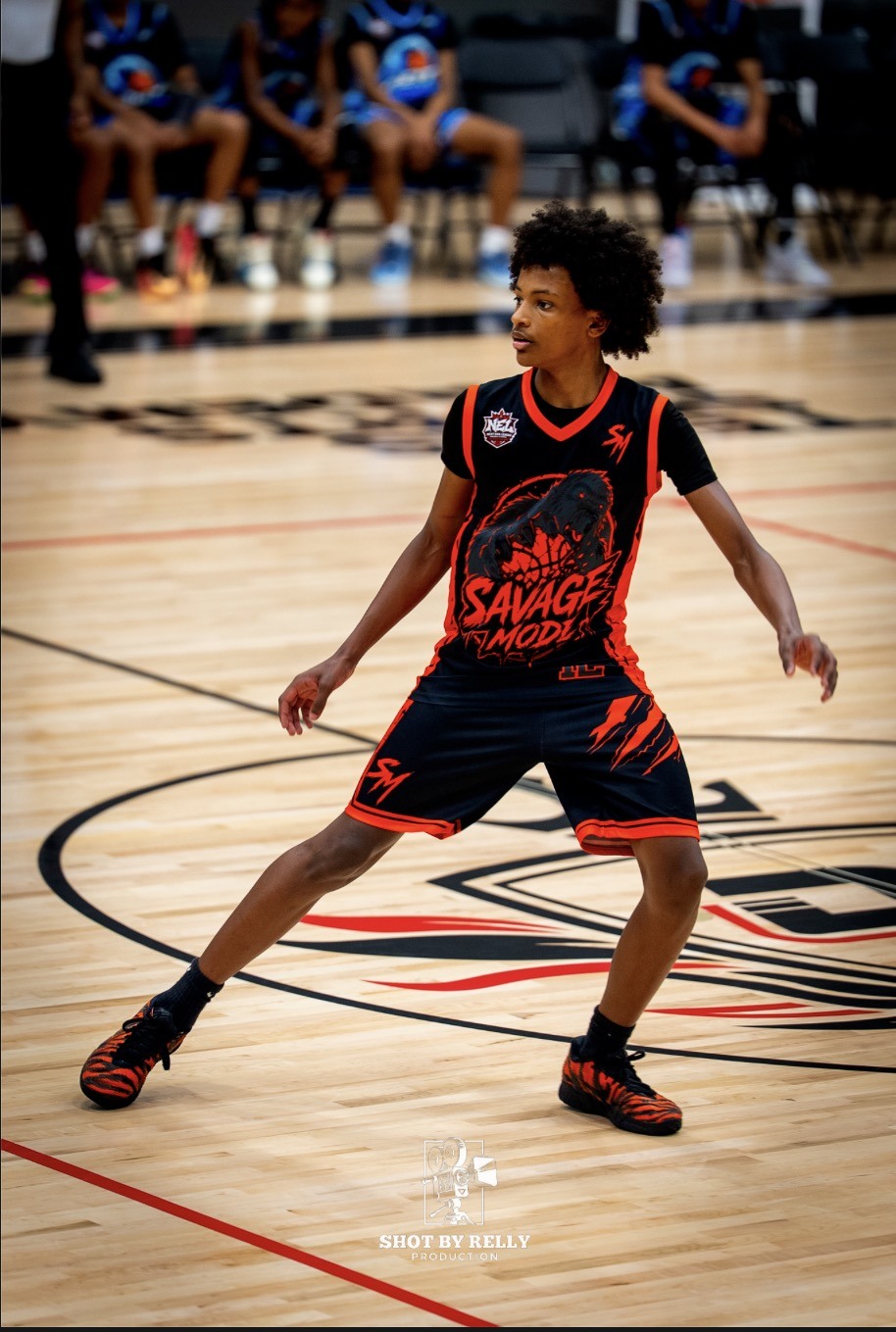 Quentin in a defensive stance on the basketball court