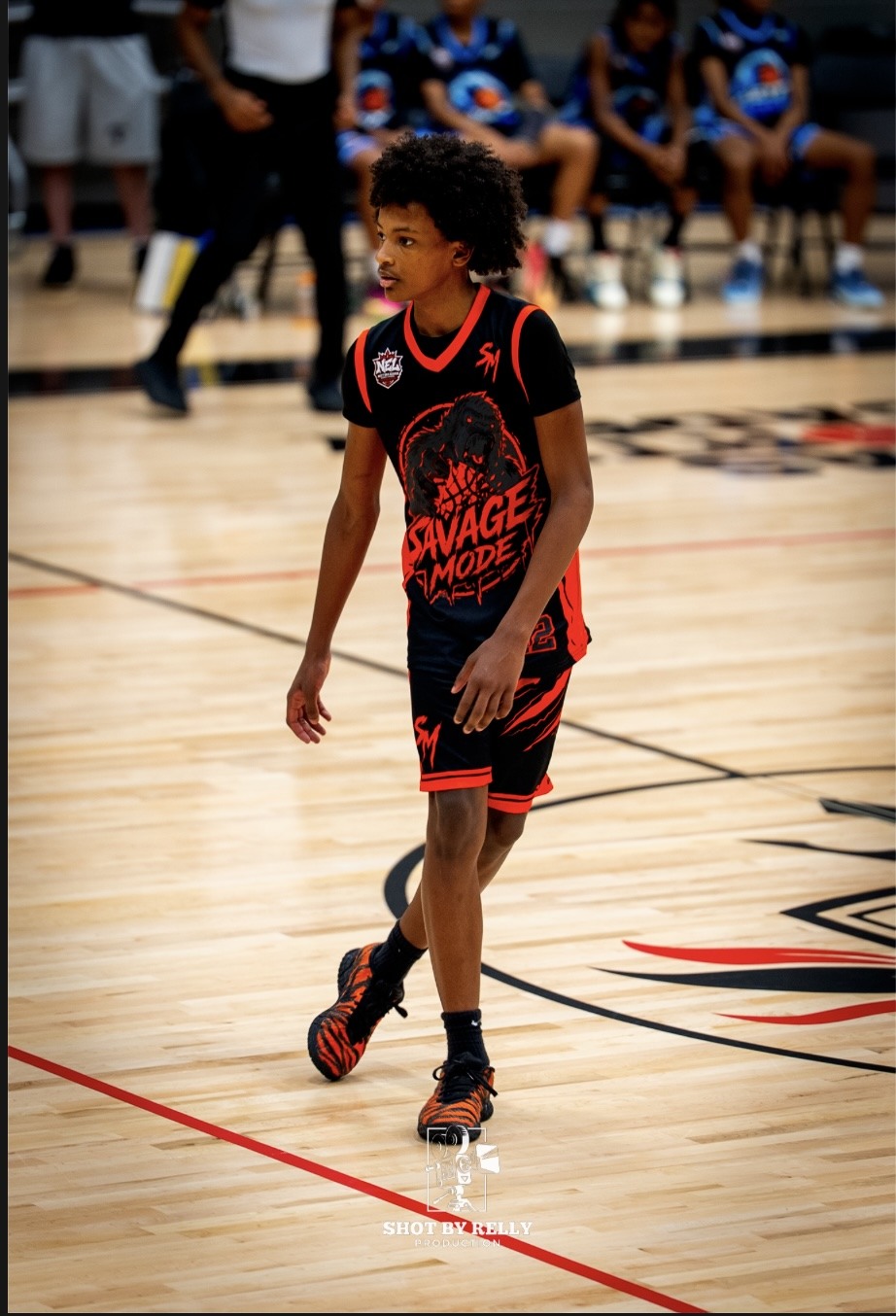 Quentin walking across the court in his Savage Mode uniform